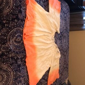 Swimsuit cover up or off the shoulder boho blouse.